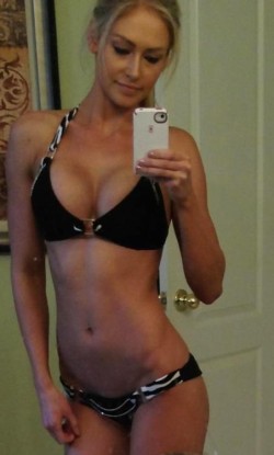 Fit chick takes selfie with her tits out