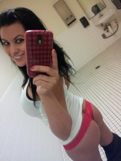 College chick snaps a selfie in a red thong