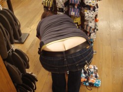 Big round ass bent over in public