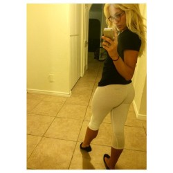 Blonde selfie in white leggings