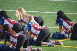 Cheerleaders know how to assume the position