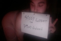 Sissy Loser Posing with a Fan Sign