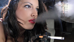 Giantess Blows Smoke at Caged Man Slave