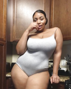 Thick Busty Black Chick Rocks a Bodysuit