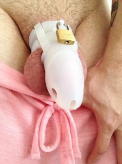 Caged sissy training to become a cocksucking slut