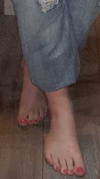 bare feet and painted toes