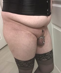 Sassy sissy pose in her black stockings and corset. Sissy doesn’t have this much attitude after  ...