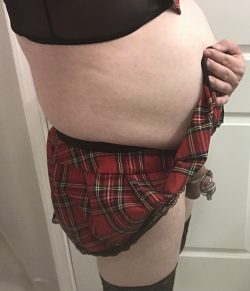 Hiding a locked boner under her skirt. Bad sissy. A smaller cage will be worn permanently.
