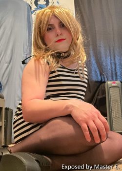 Exposing sissy Nikki A in her striped dress
