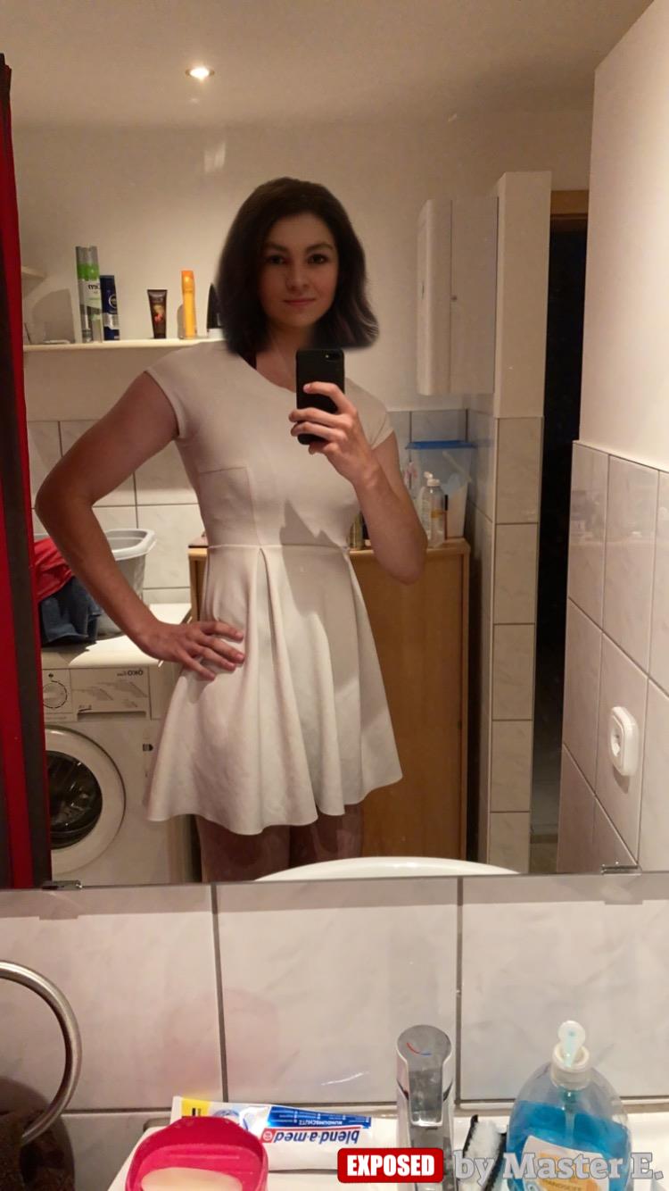 NkSissy posing in her sexy white dress