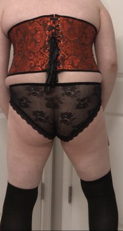 Matching corset, panties, and stockings for cucky.