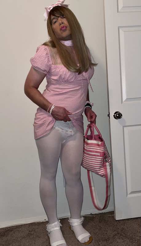 Sissy appropriately dressed to beg for exposure and cock