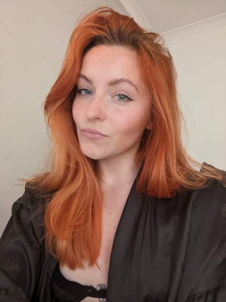 Sassy redhead mistress giving sissies orders on cam