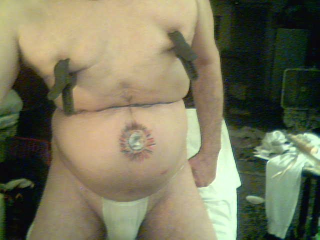 my nipples clamped, belly painted and exposed in dirty g string