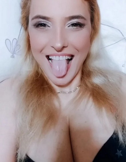 Blonde milf with big tits teases men on webcam