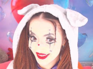 Cute mischievous clown streaming on cam