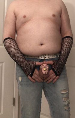 Sparkling cucky in his little pink chastity cage.