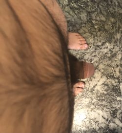 Photo of singer-songwriter Champ Hercules naked showing off feet and little penis