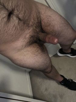 Rockstar Champ Hercules shows off hard cock wearing nothing but sneakers
