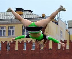 Cheerleader doing a flying crotch shot