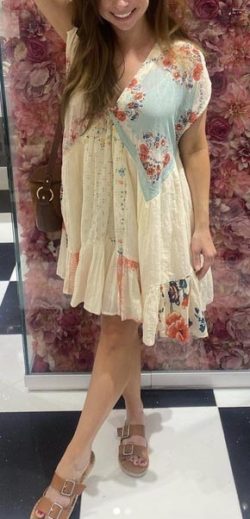 Beautiful trophy wife in cute dress and sandals
