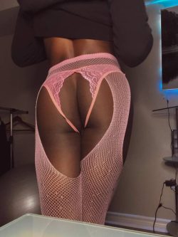 Black sissy in pink fishnet stockings waiting for some big white dick to ride