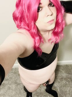 Sissy slut Donna with micropenis locked away and dressed in leather. She is so fuckable, no?