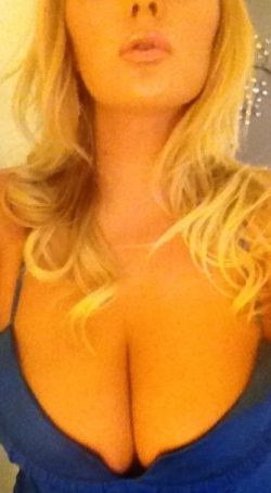 Hot blonde pulls out her big tits for you