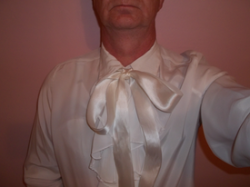 Look my siissy pansy poofy wearing here big white blouse sissy deserve to be expose and get humi ...