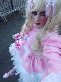 Pink sissy maid Marga in public