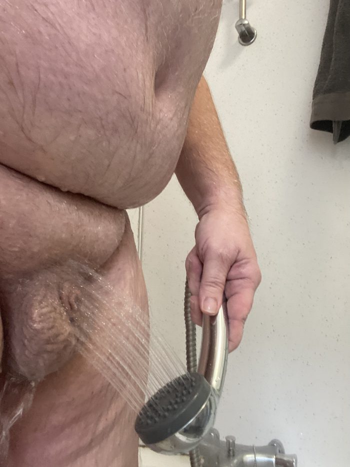 Micro dick having a shower