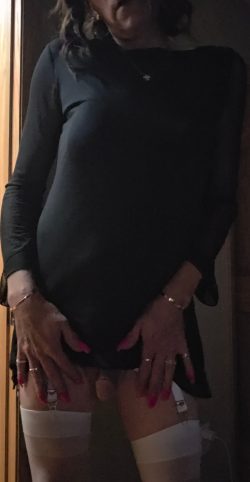 Sissy exposed in garter and nylons exposing her useless clitty